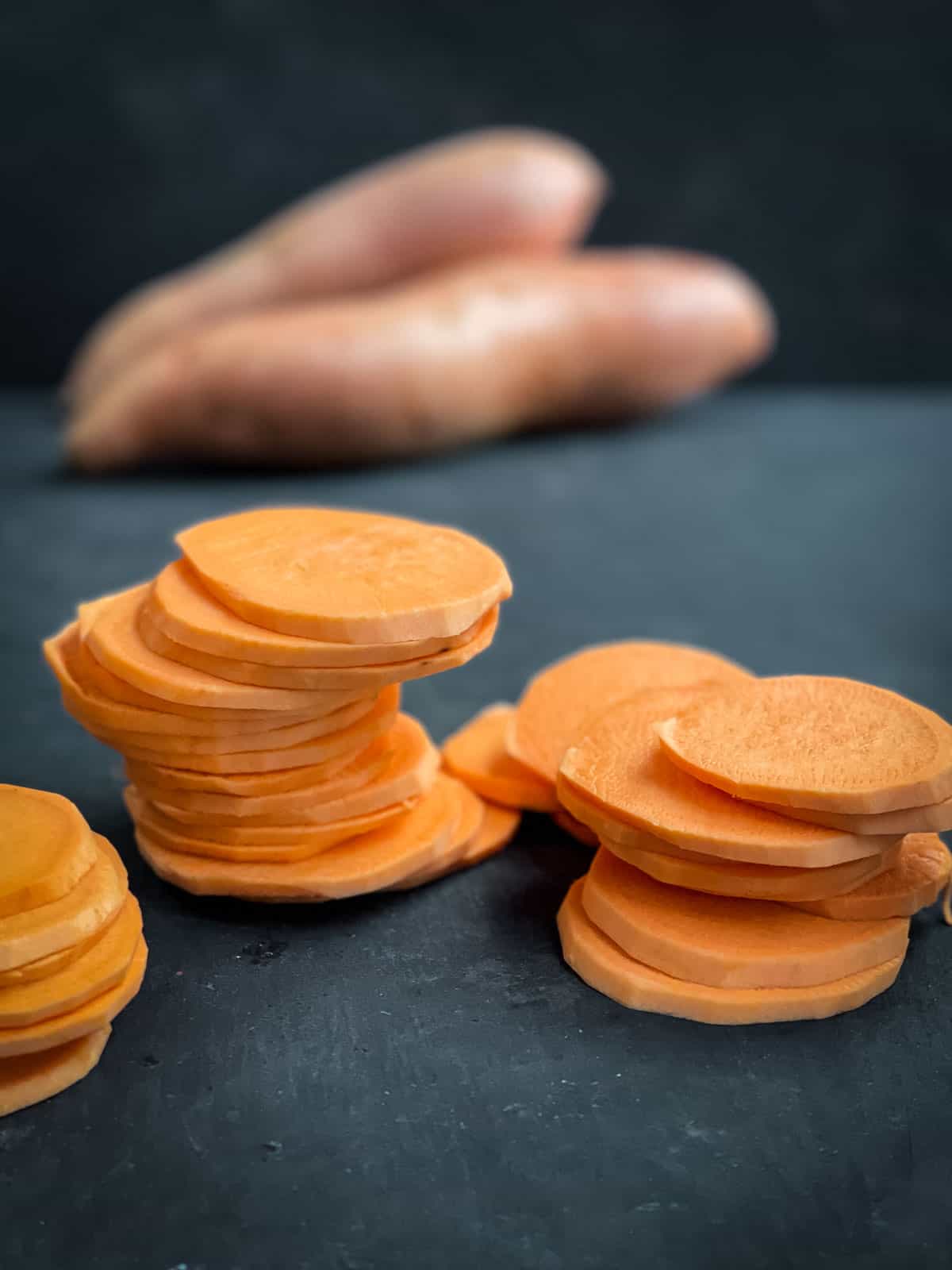 Fresh sliced sweet potato in a stack