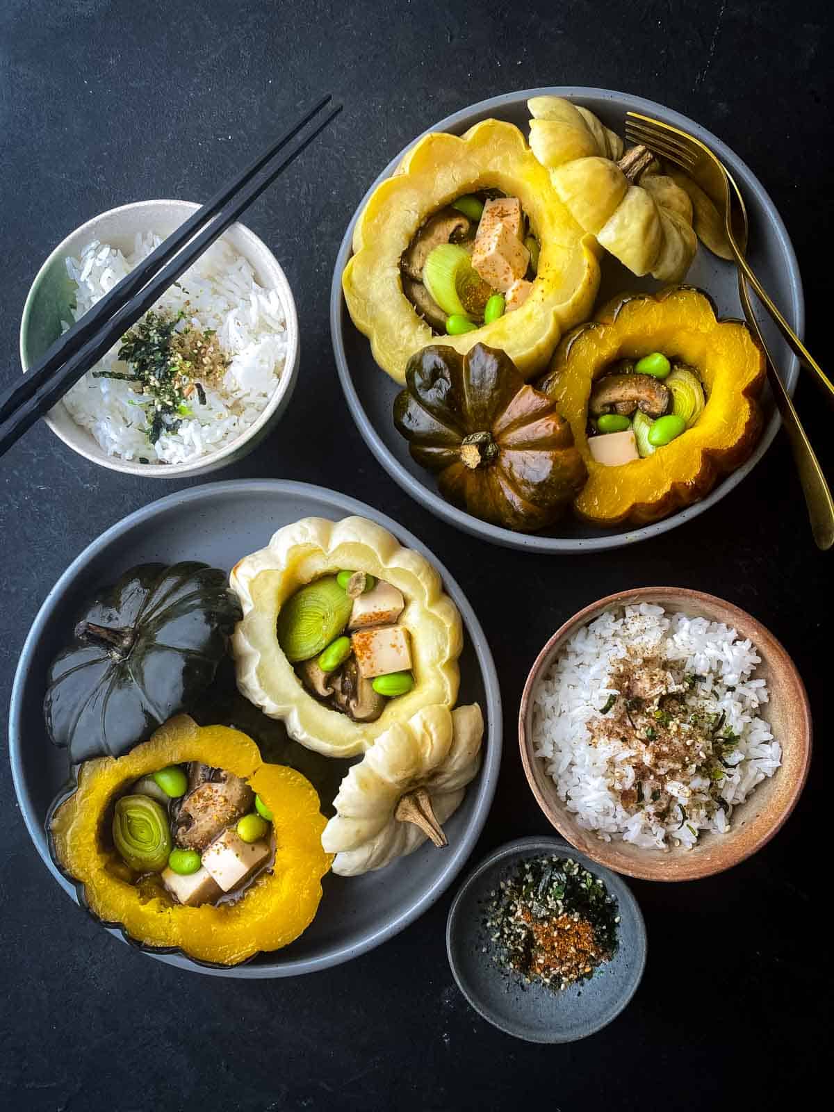 2 Baked Miniature Pumpkins with Shitake in bowls served with rice