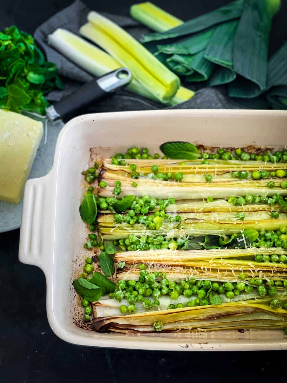 Roasted Leeks and Peas in a baking dish