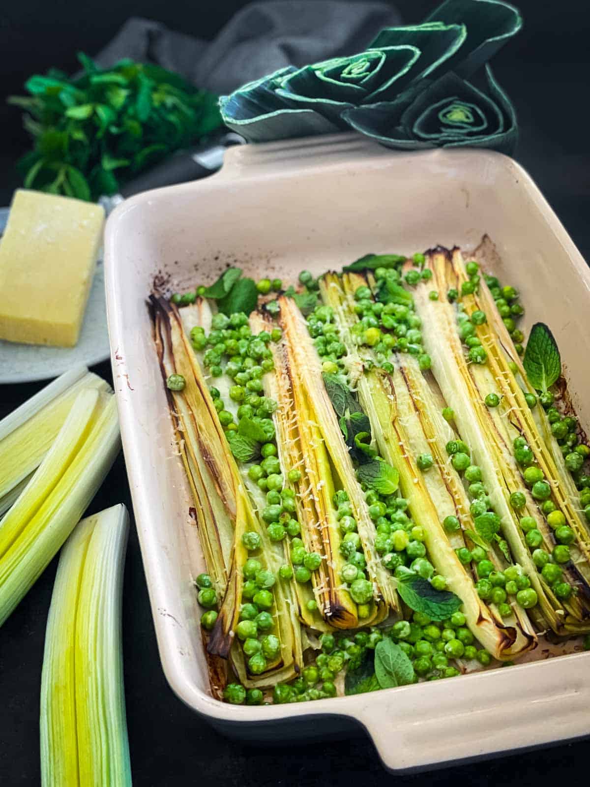 Roasted Leeks and Peas in a baking dish