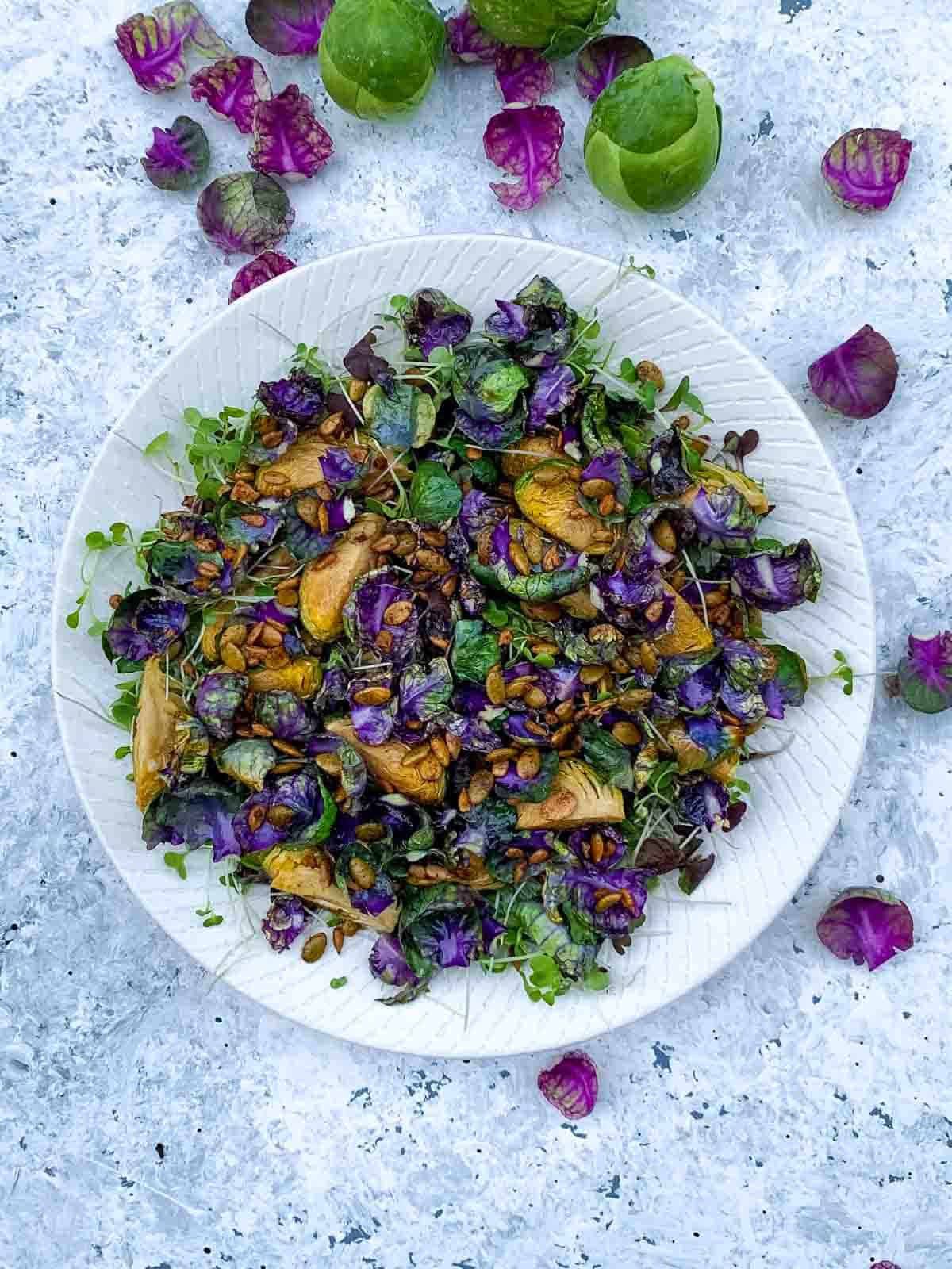 Roasted Purple Brussels Sprouts Salad on a white plate