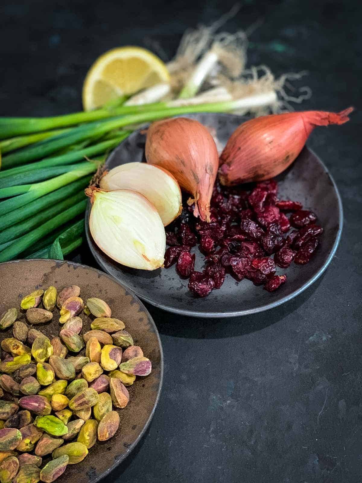 Pistachios, dried cranberries, shallots, spring onions and lemon