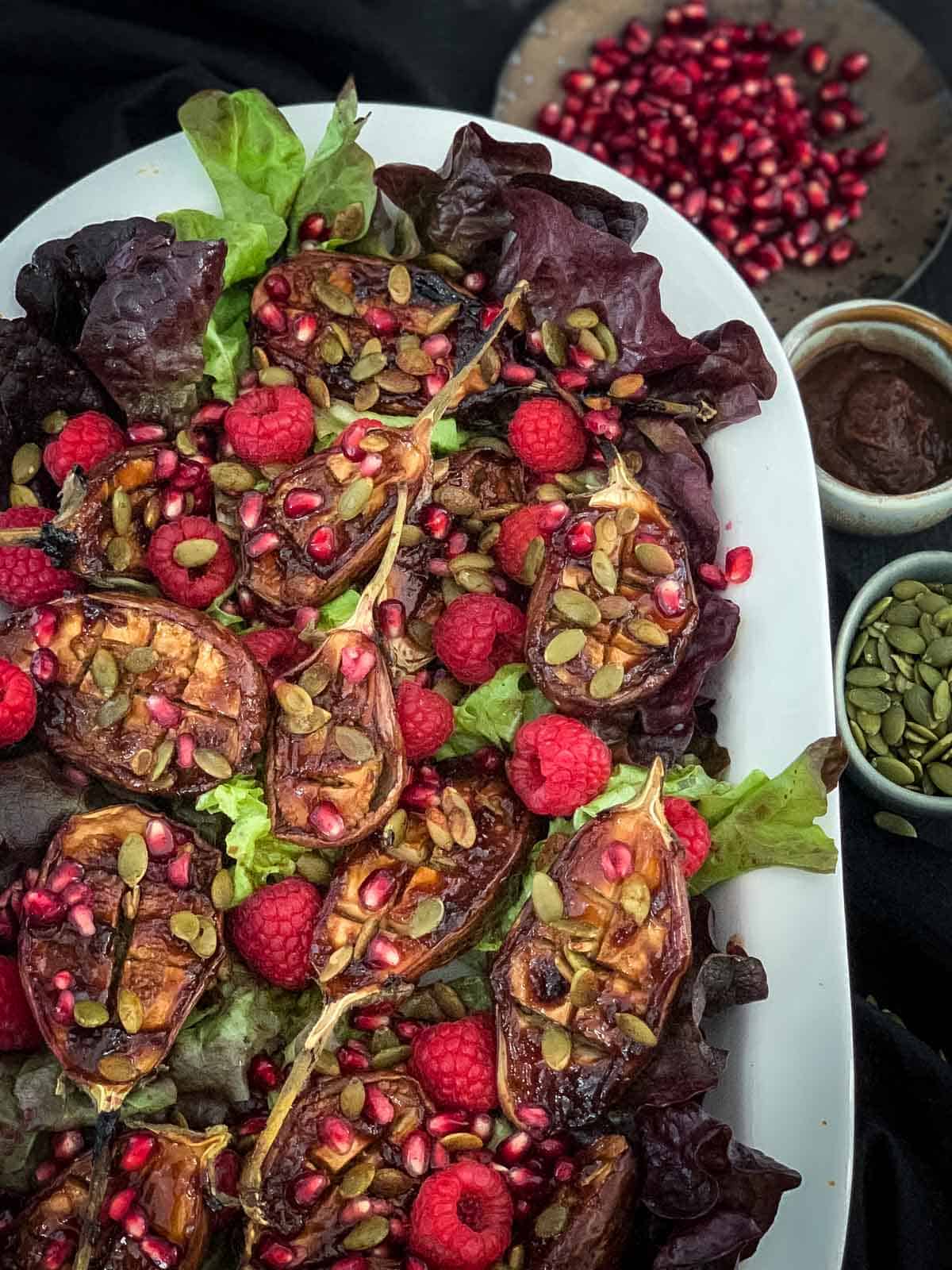 Tamarind Roasted Baby Eggplant Salad on a large oval platter