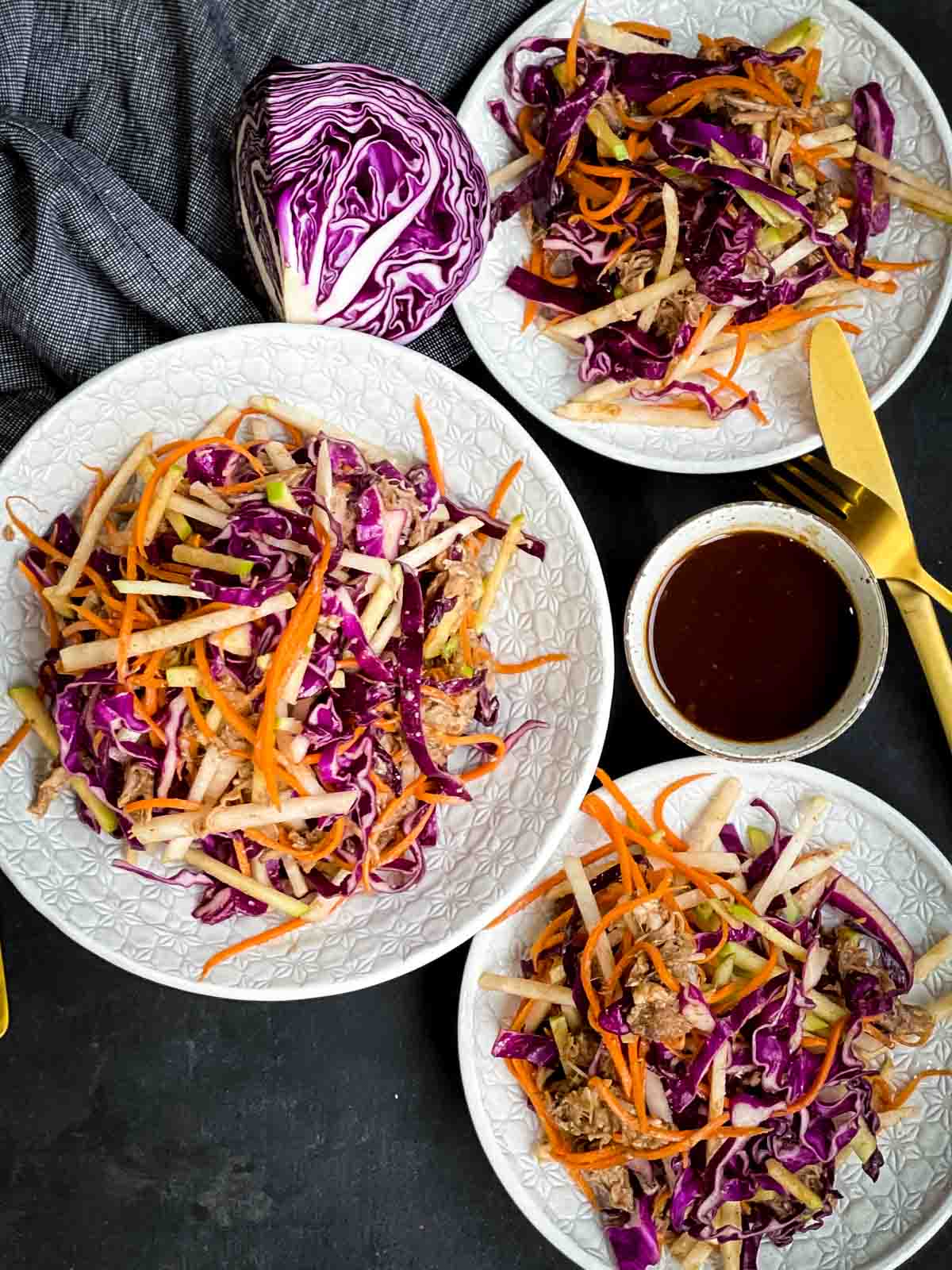 3 BBQ Pulled Pork Salads with BBQ salad dressing on the side with gold cutlery