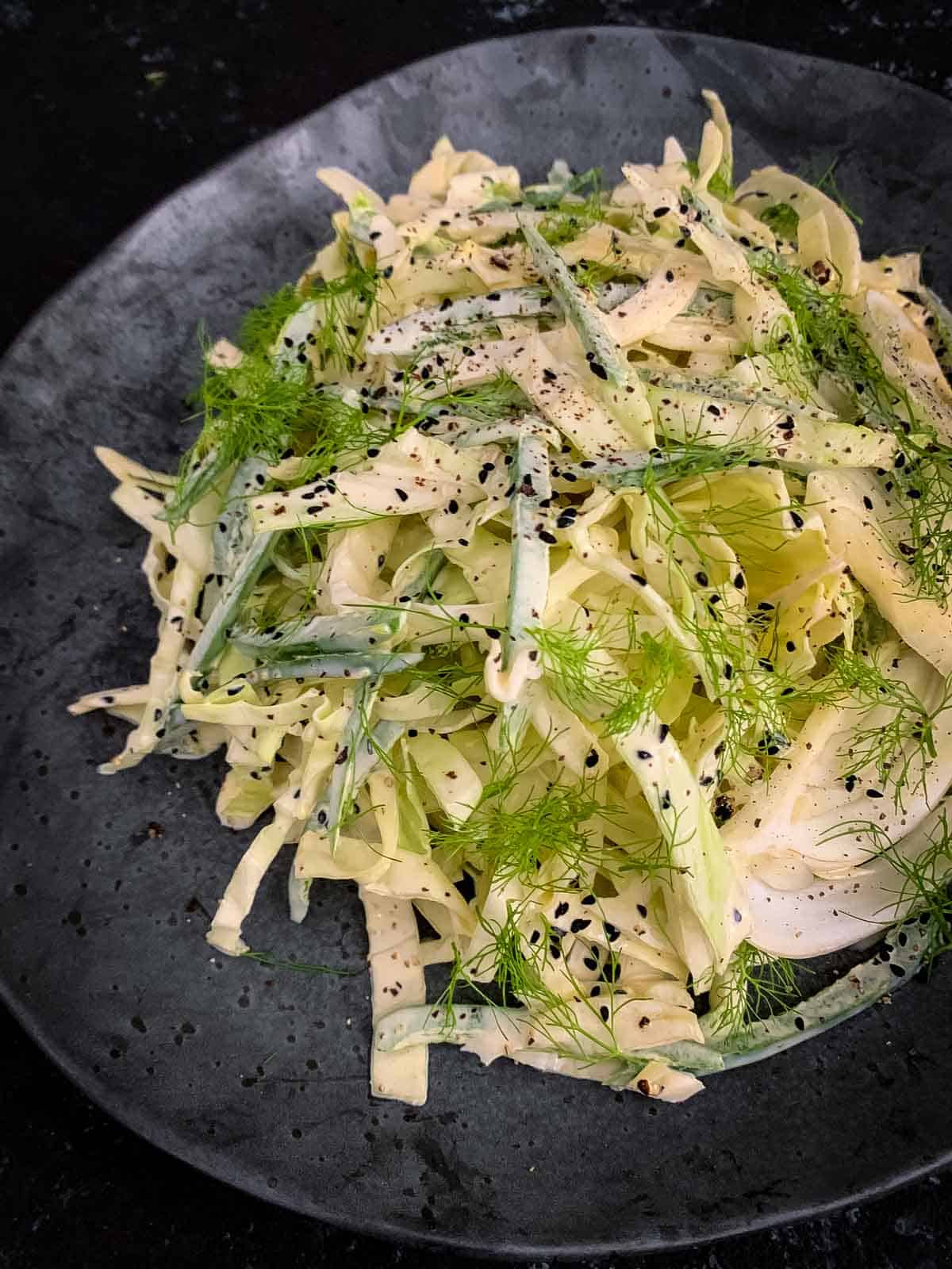 Spicy Keto Coleslaw on a black plate