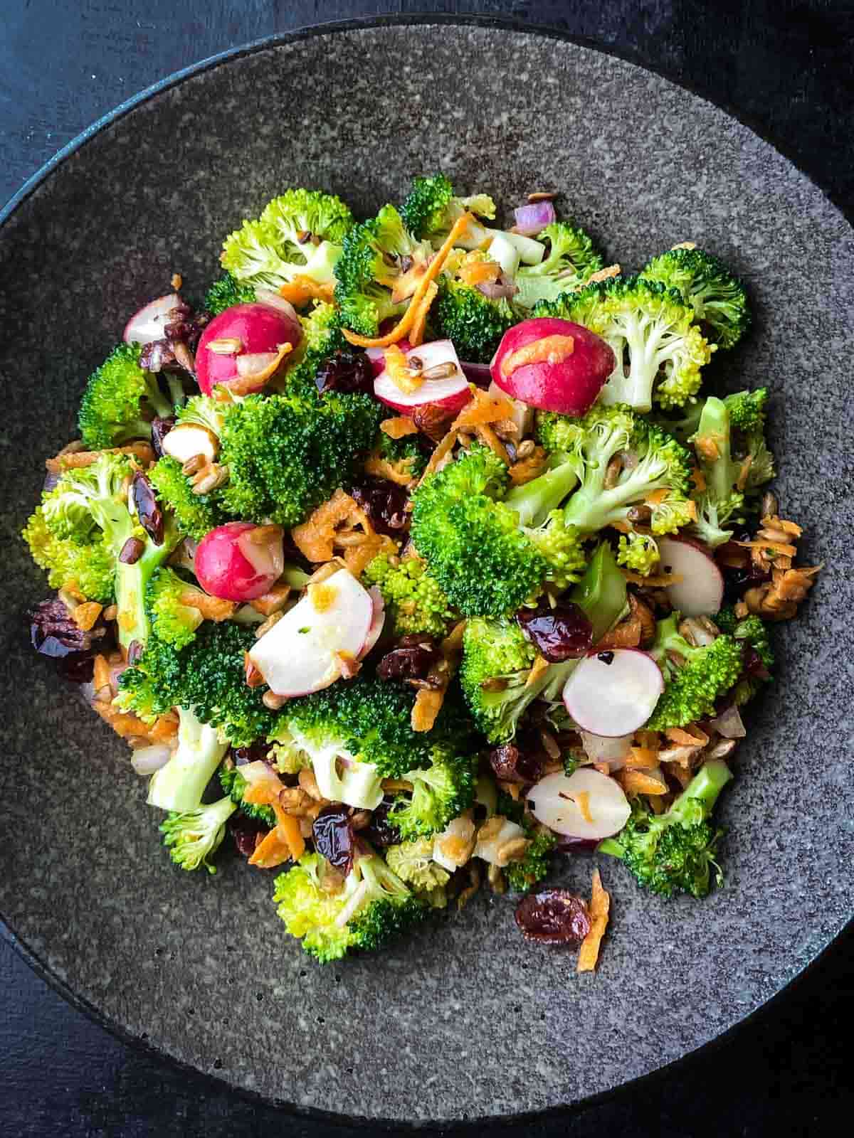 Vegan Broccoli Salad [No Mayo] on a black plate