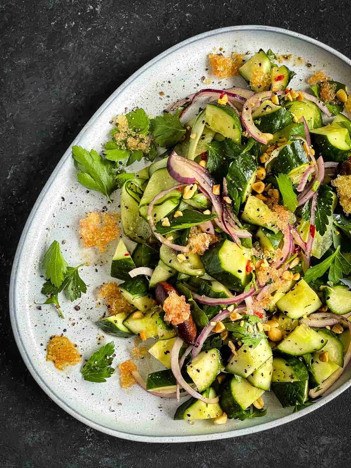 Cucumber Finger Lime Salad on a grey platter