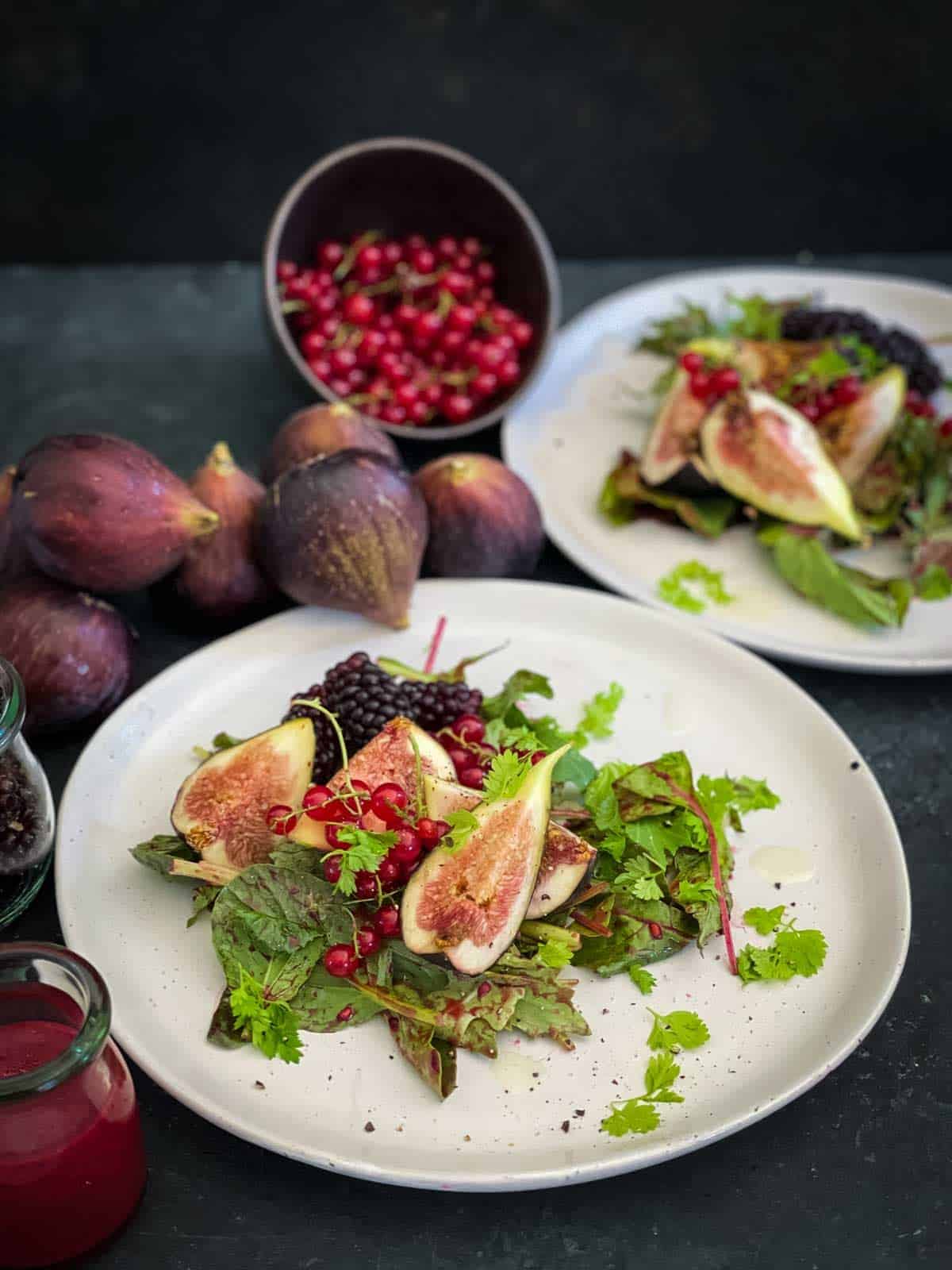 2 serves of Red Currant Salad with Figs on white plates