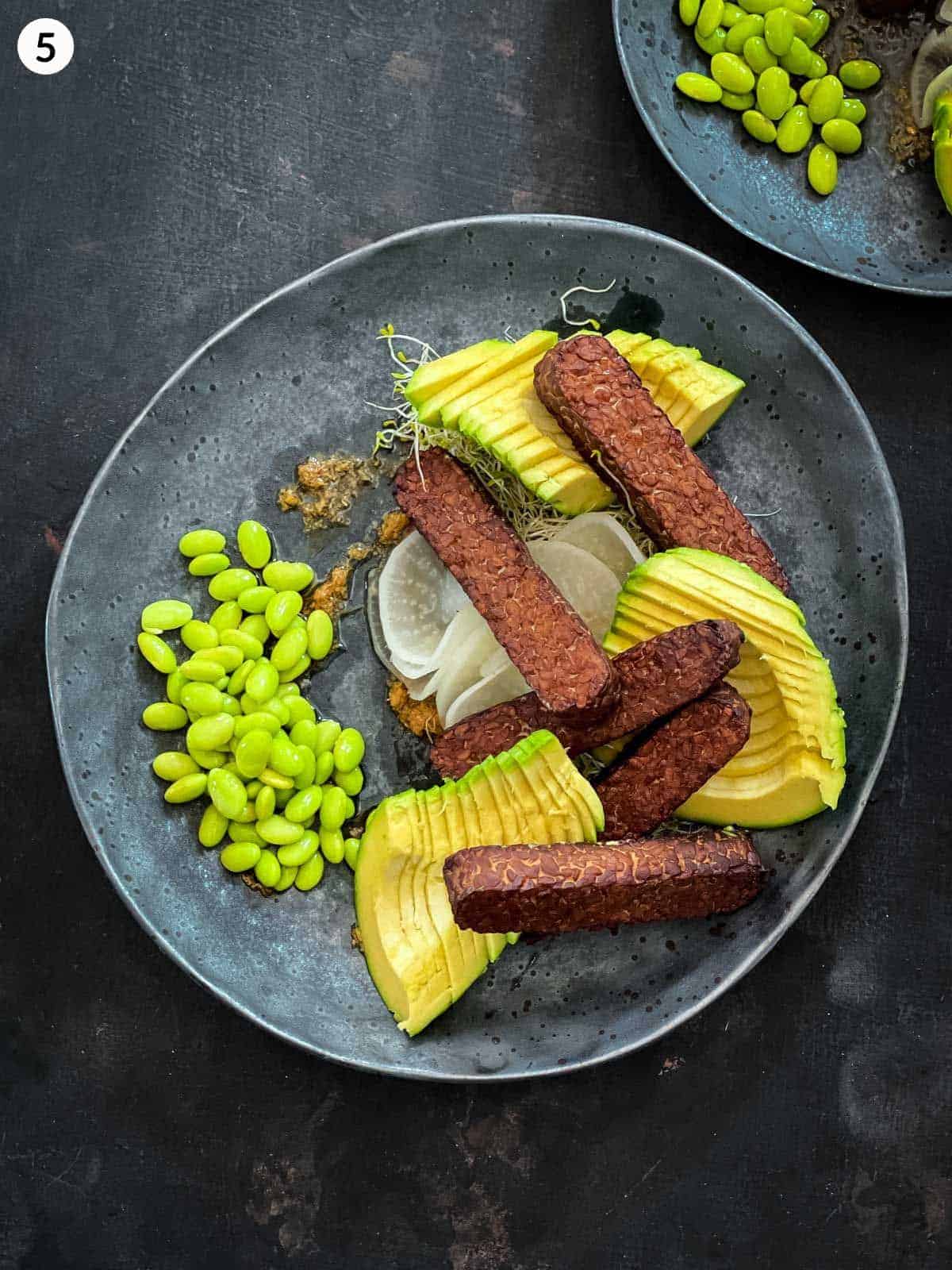 instructions for how to plate Baked Tempeh Salad