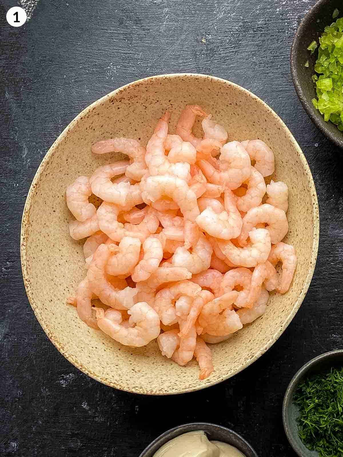 a bowl of fresh peeled shrimp