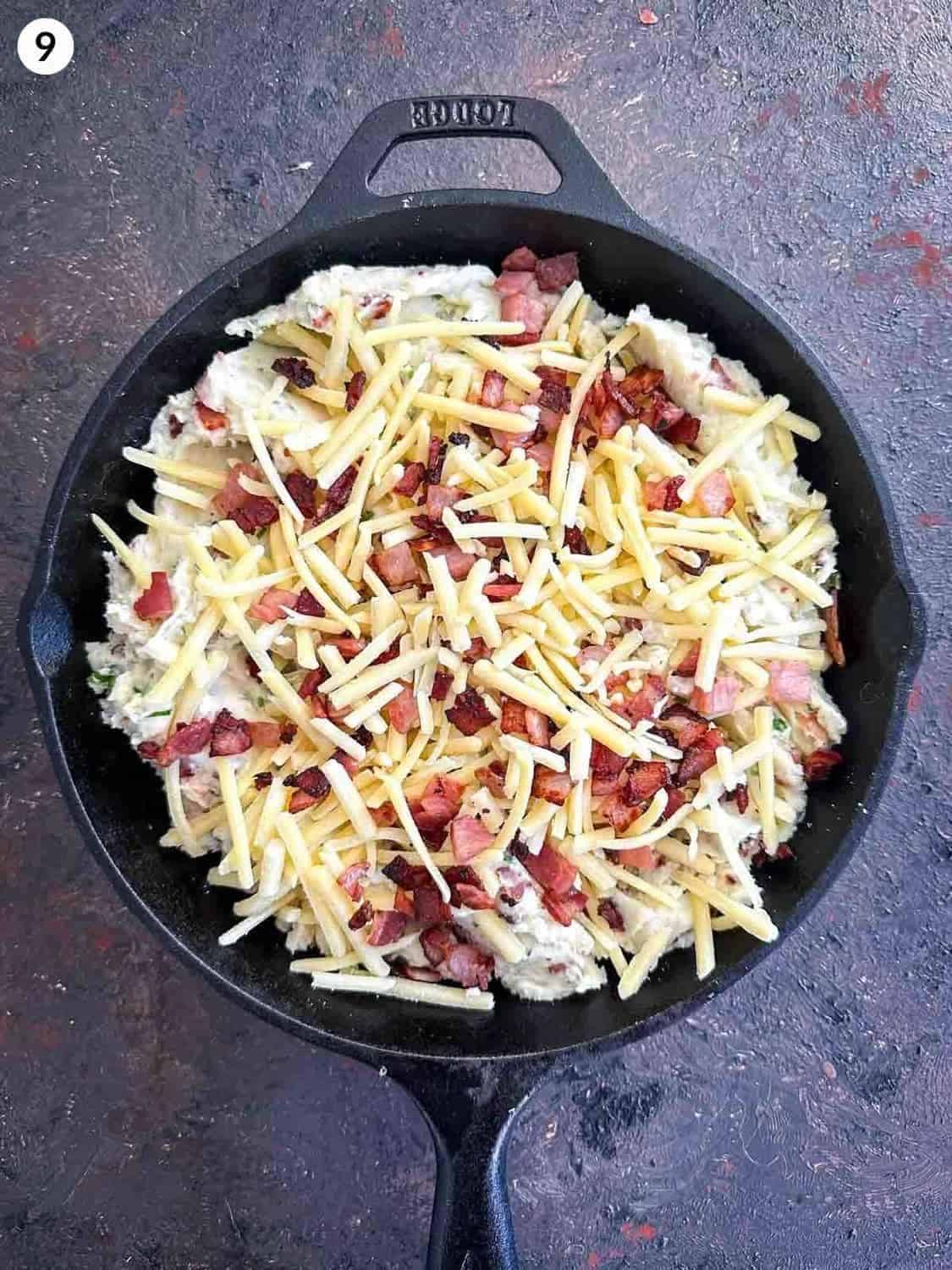 Uncooked Twice Baked Mashed Potatoes in a skillet