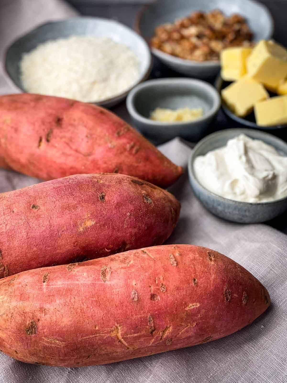 3 large sweet potatoes with butter, breadcrumbs and sour cream on the side