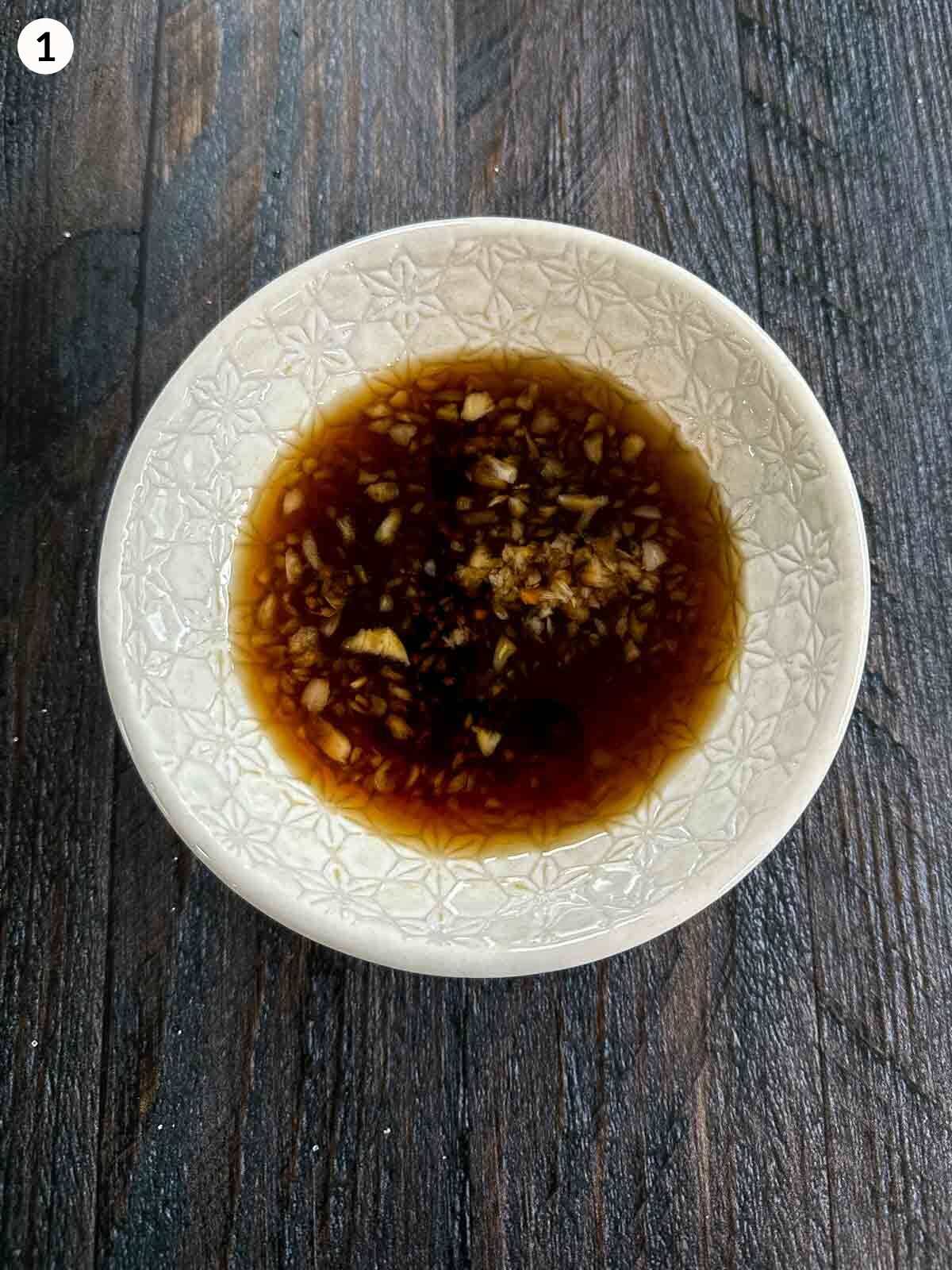 Fish sauce dressing in a white bowl