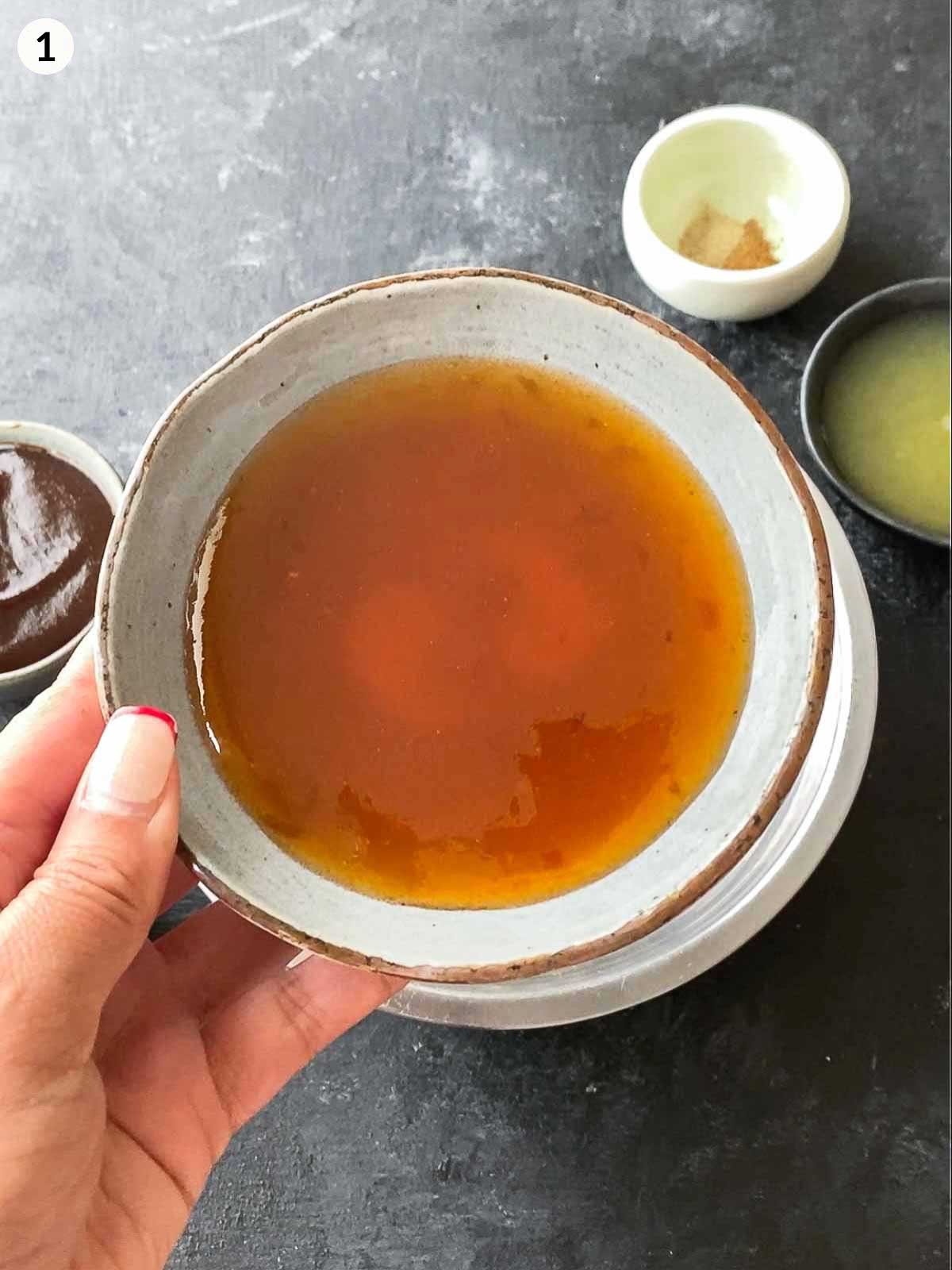 Add plum sauce into a stainless steel bowl