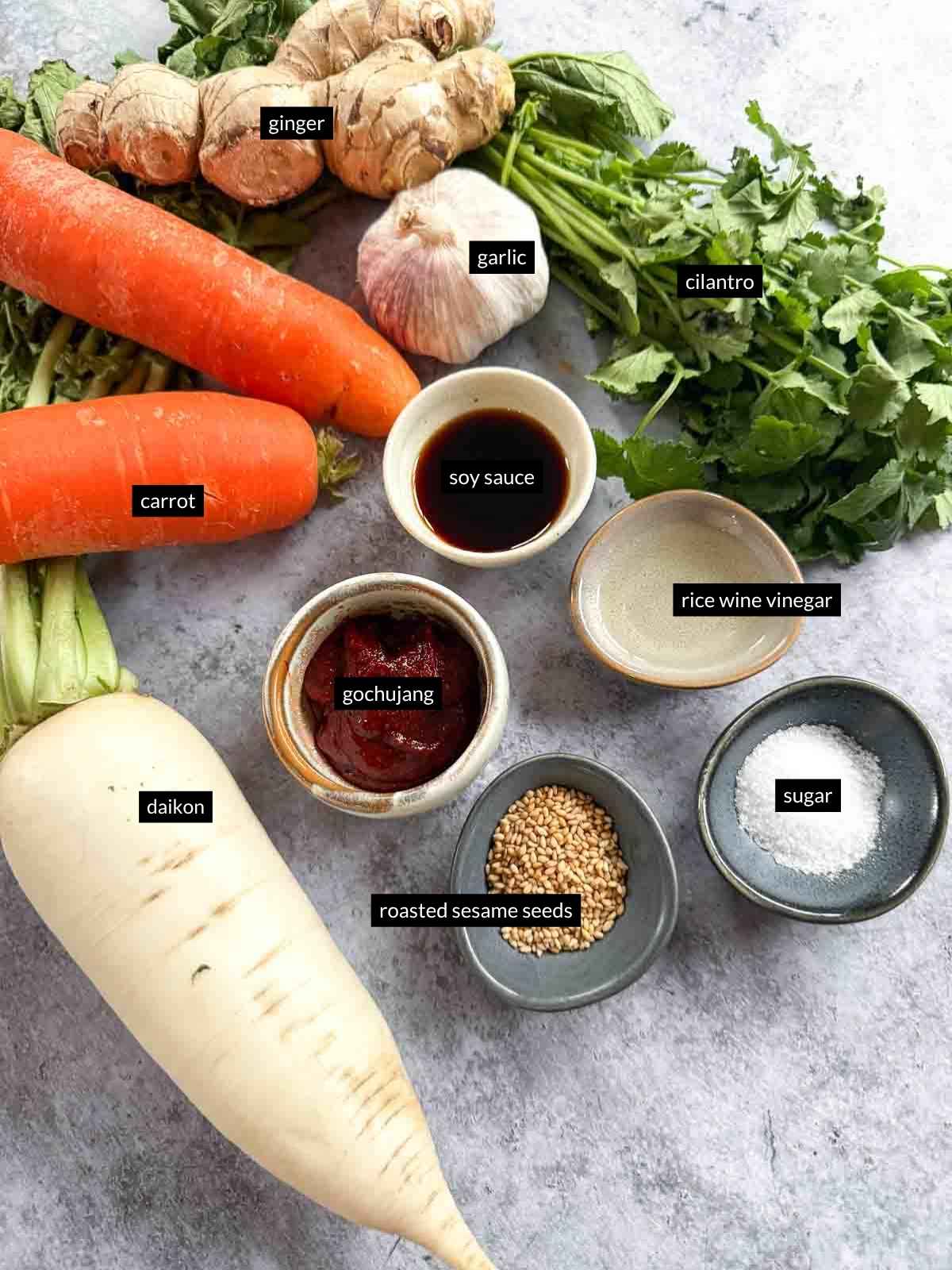 Individually labelled ingredients for Carrot and Daikon Salad with Gochujang Dressing