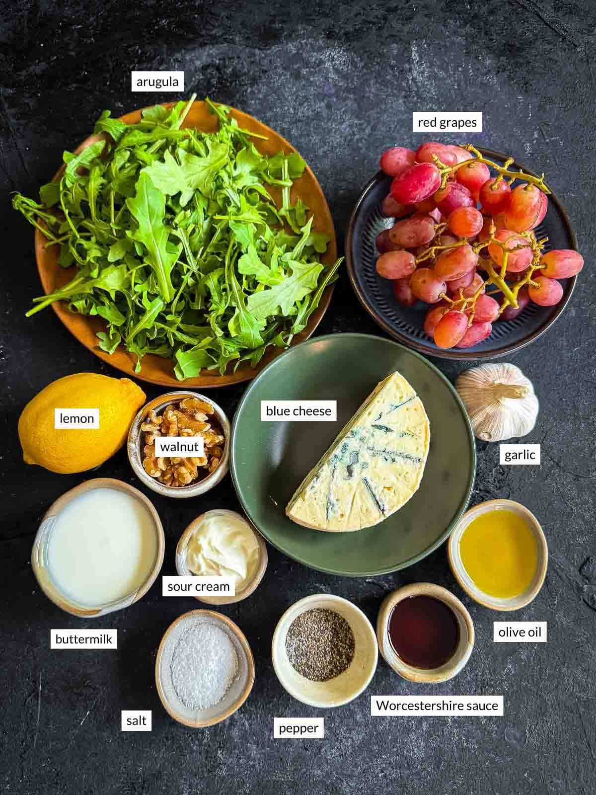 Individually labelled ingredients for Warm Arugula and Roasted Grape Salad with Blue Cheese