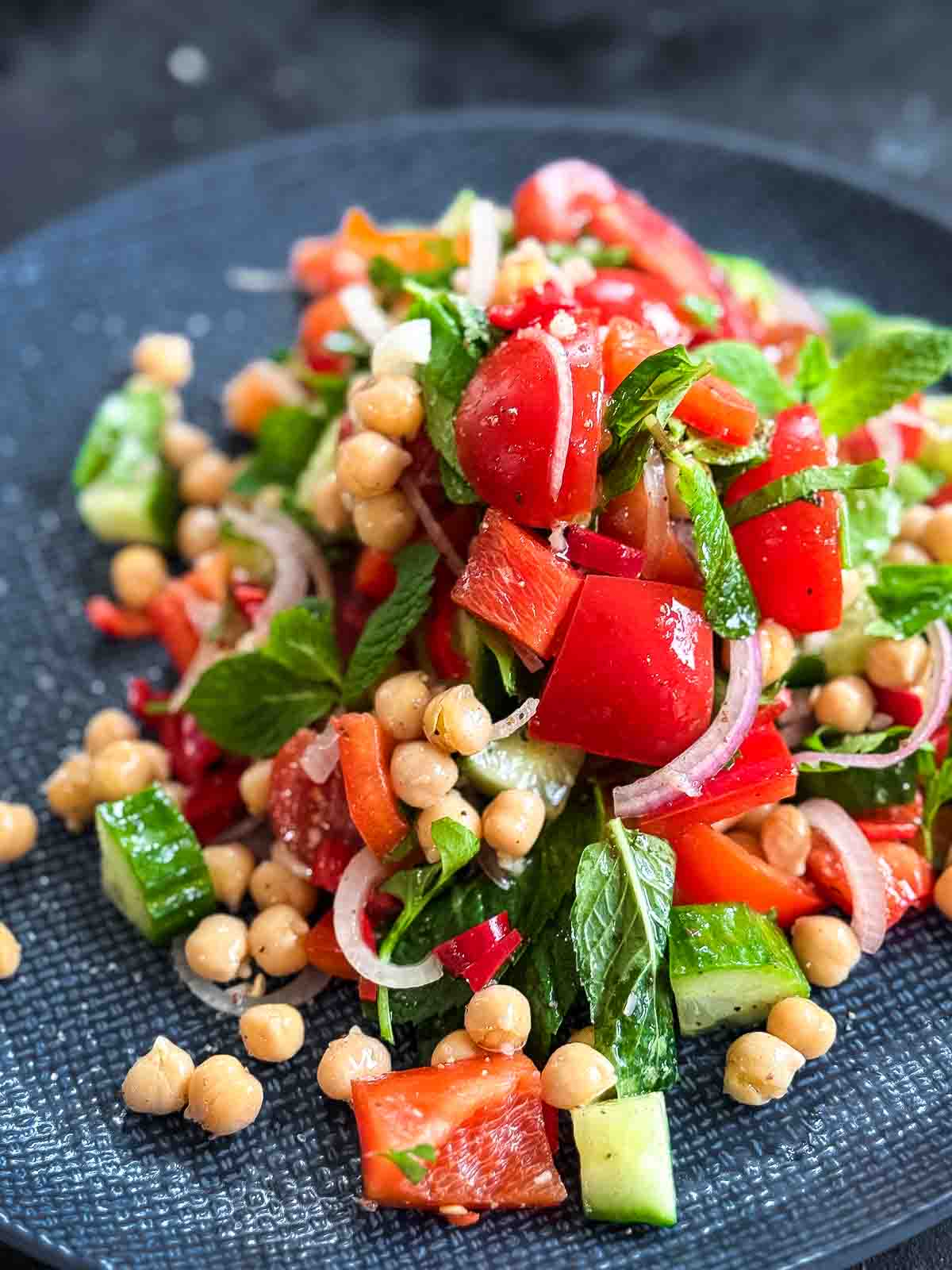 Balela salad on a blue plate