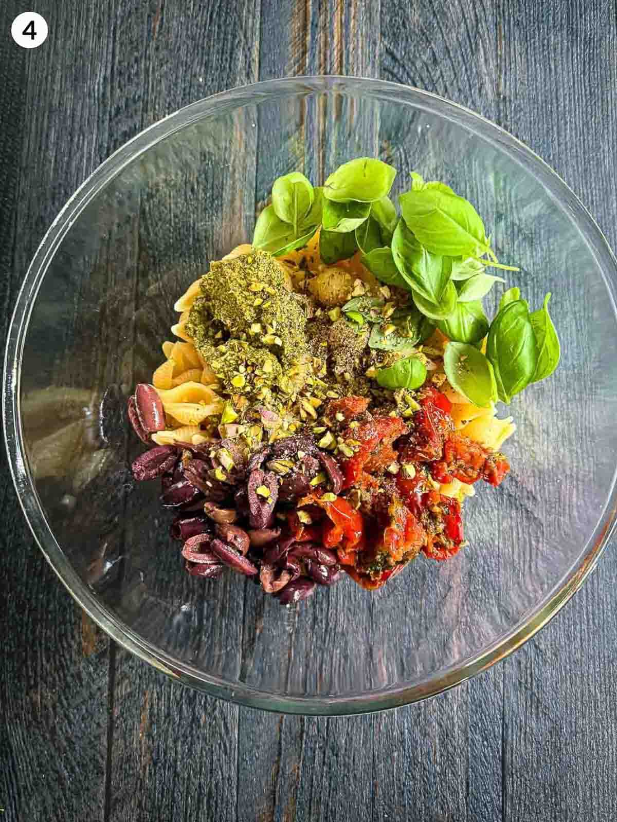 bowl of ingredients for Semi-dried Tomato Pesto Pasta Salad